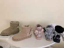Load image into Gallery viewer, Glittery Bow Ugg Boots
