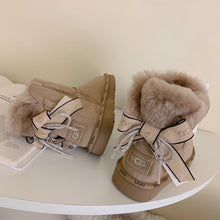 Load image into Gallery viewer, Glittery Bow Ugg Boots
