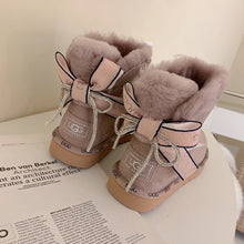 Load image into Gallery viewer, Glittery Bow Ugg Boots
