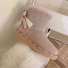 Load image into Gallery viewer, Glittery Bow Ugg Boots
